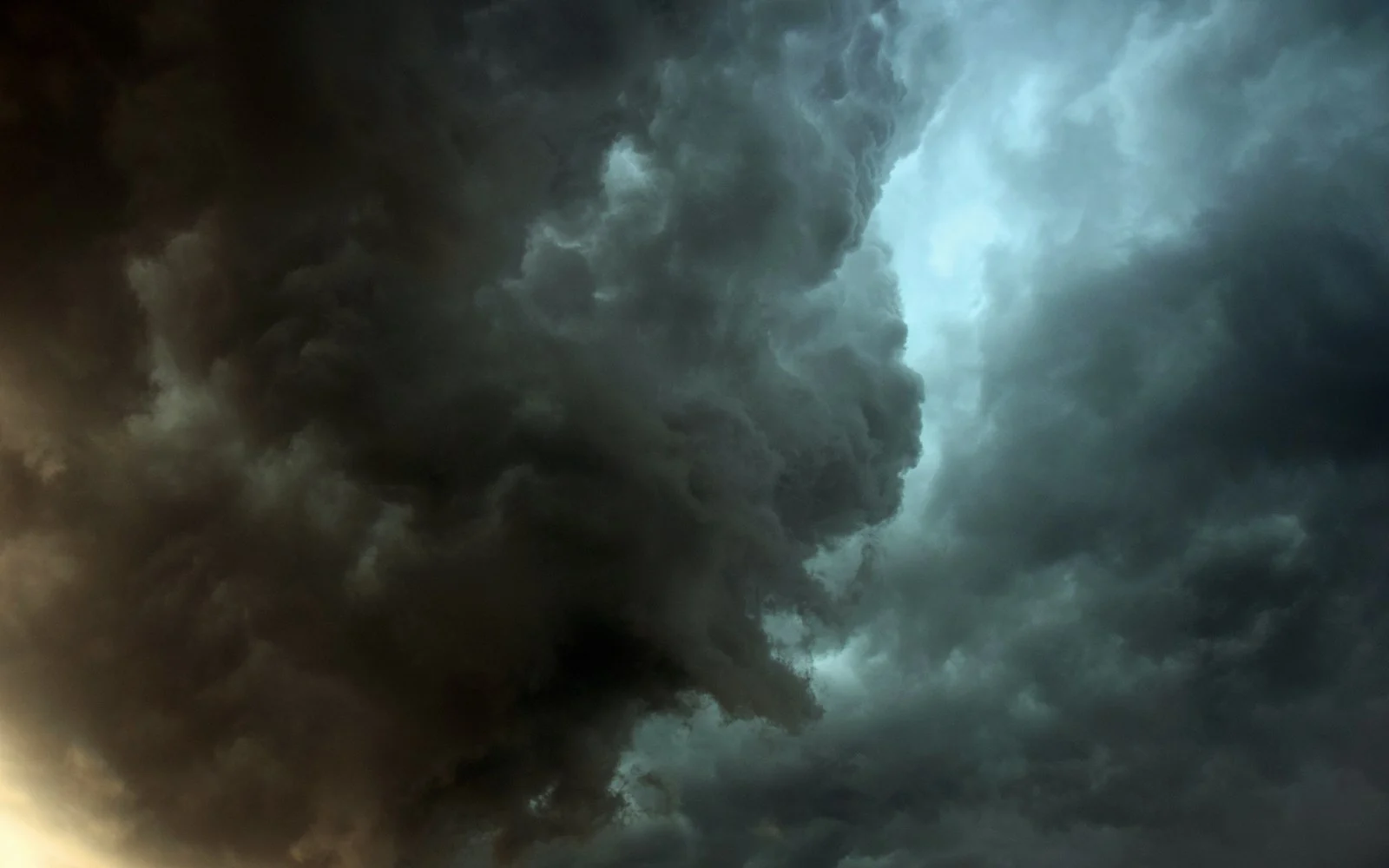 Dark clouds massing overhead